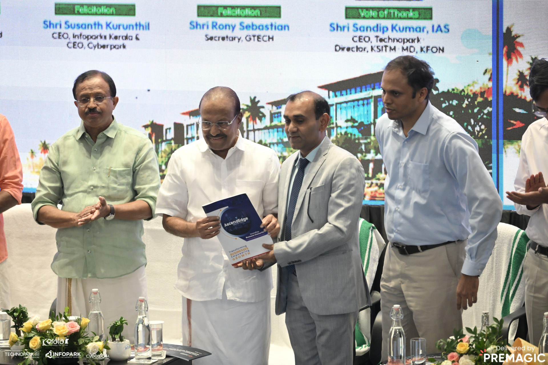 Shri P. K. Kunhalikutty, Hon'ble Minister for Industries, Commerce, IT & AI, receiving the AscendEdge report at the felicitation ceremony.