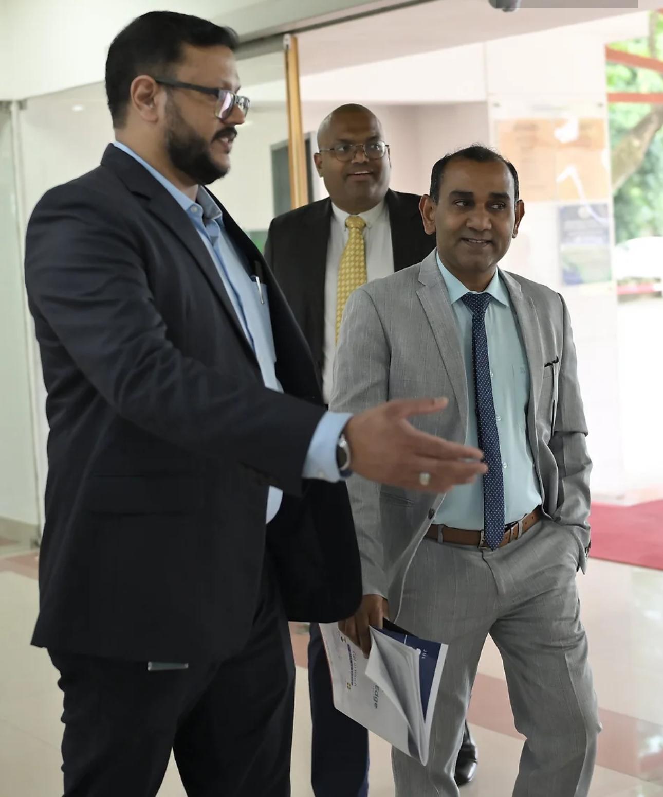AscendEdge delegation in conversation at the Technopark campus.