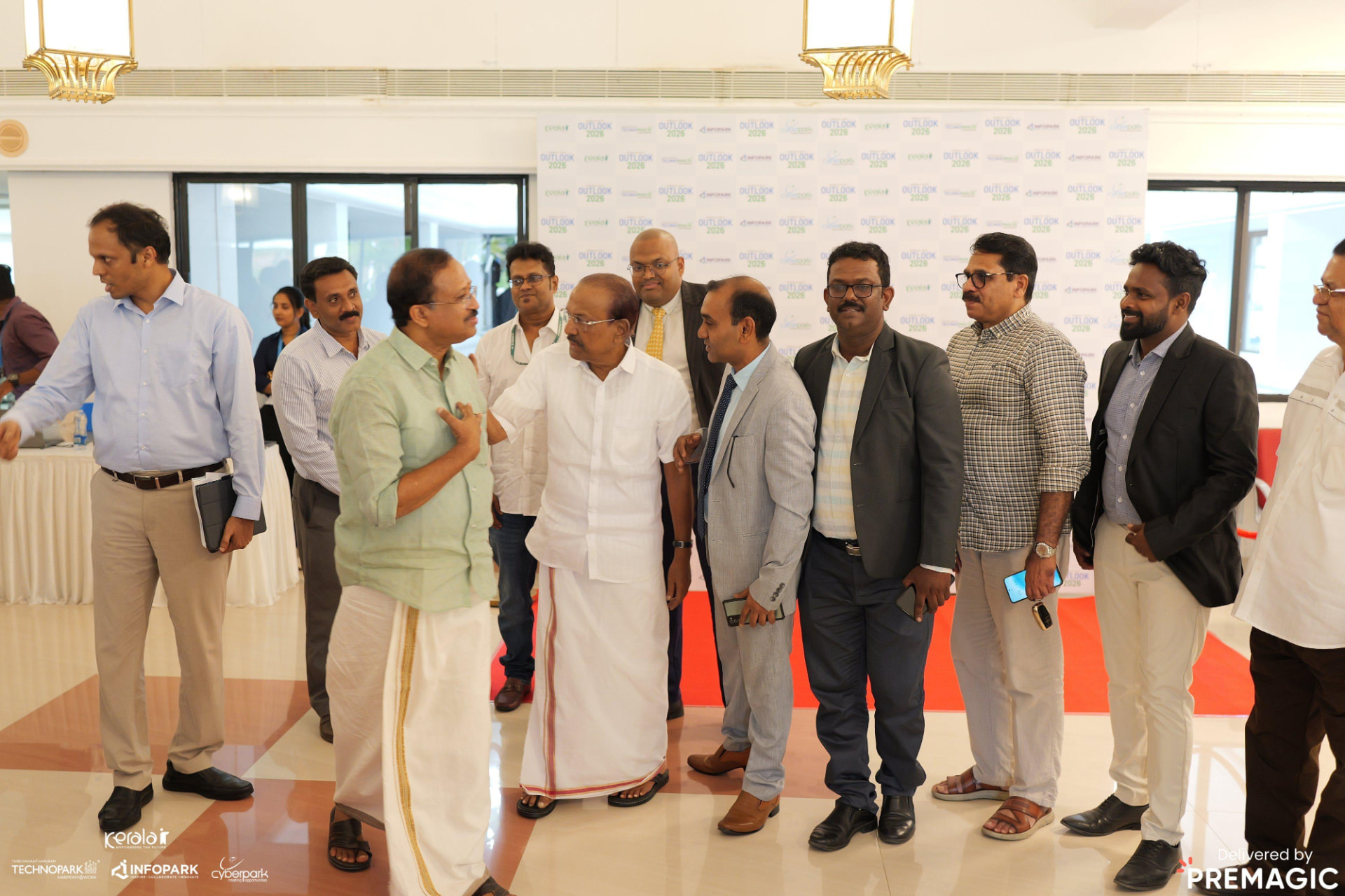 Consortium partners and officials at the Outlook 2026 reception, Thiruvananthapuram.